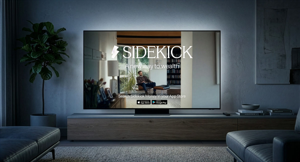 Room with a large TV displaying an advertisement for